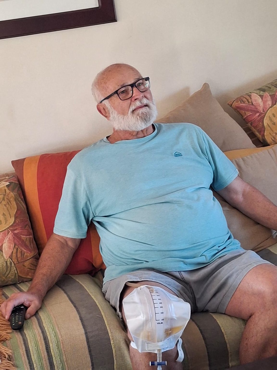 Jean at home with catheter and urine bag - living with dignity and quiet determination